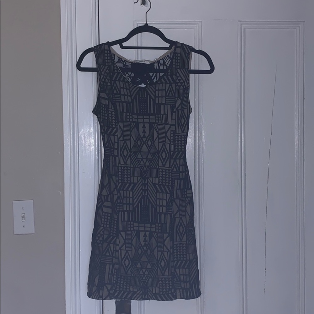 Black pattern open back dress